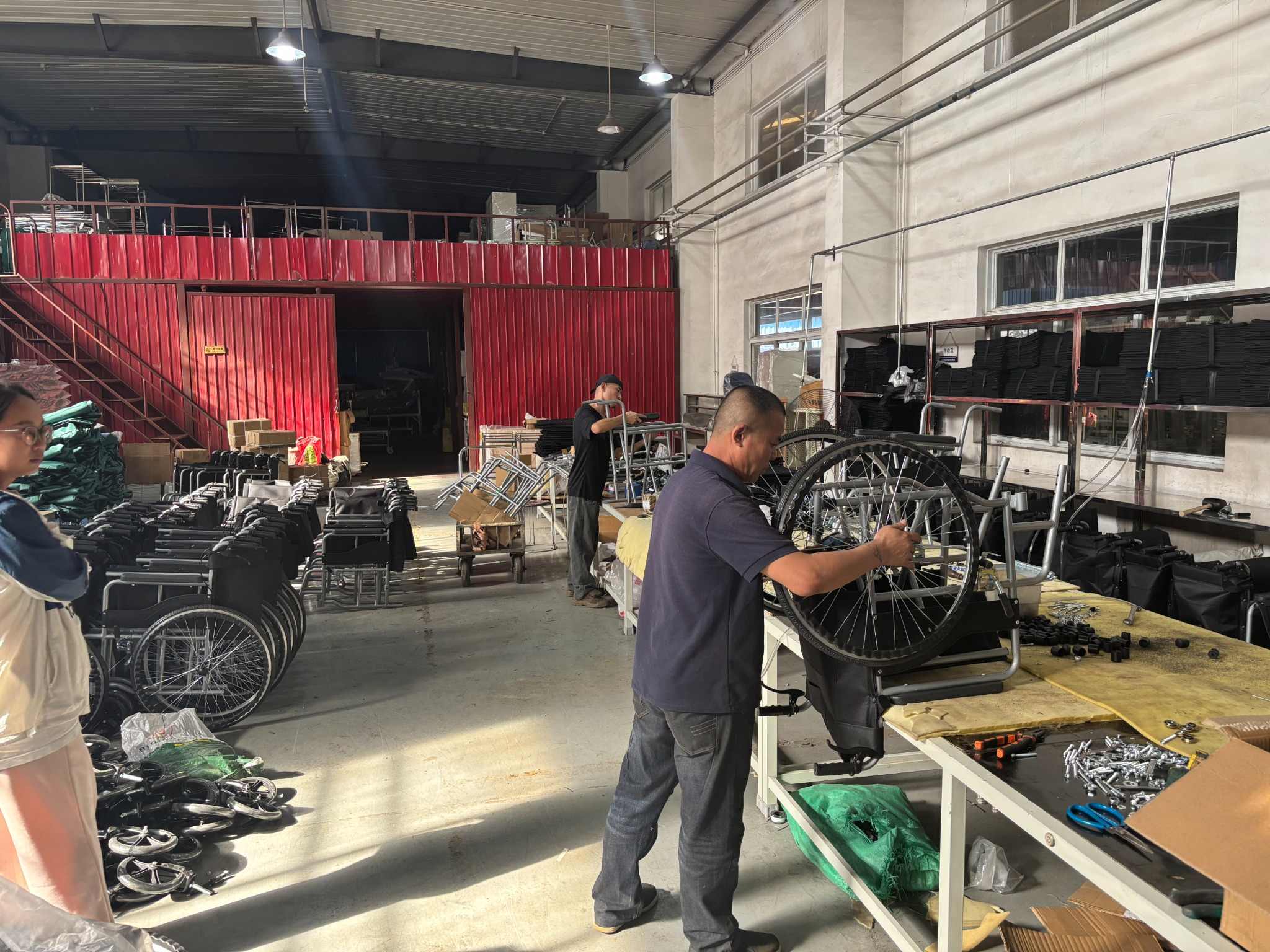 wheelchair-assembly-line-worker-01 wheelchair-assembly-line-worker-01