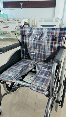 Wheelchair with a hole for a catheter entering the scene picture.jpg